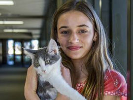 Student Abby with her cat